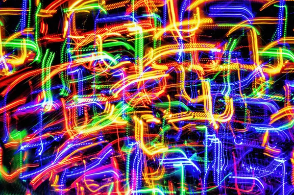 abstract blurred background scattered with various colored lines and figures