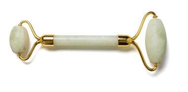 jade rollers for facial skin massage and treatment on white background, isolated