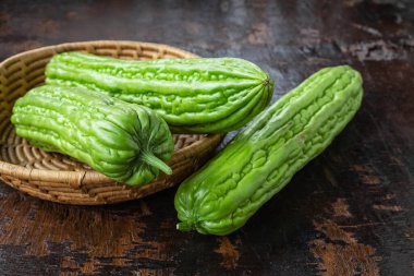 Fresh bitter gourd in a basket