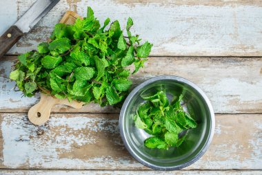 Mint herbs on a wooden table