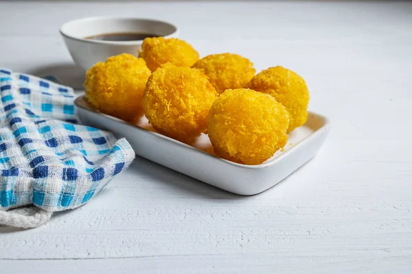 Yellow delicious fried ball cheese