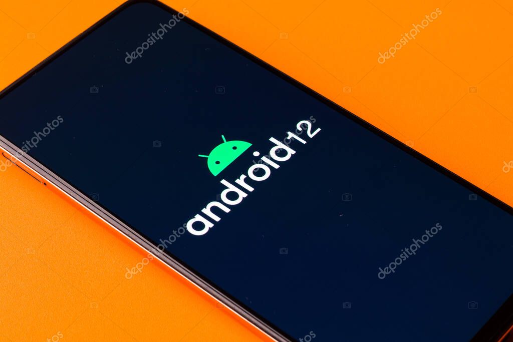 Assam, india - May 19, 2021 : Android 12 logo on phone screen stock image.