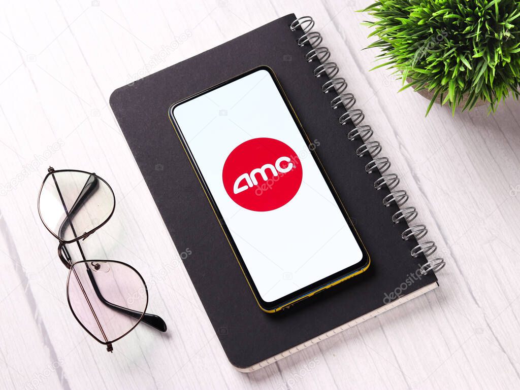 Assam, india - November 15, 2020 : AMC theater logo on phone screen stock image.
