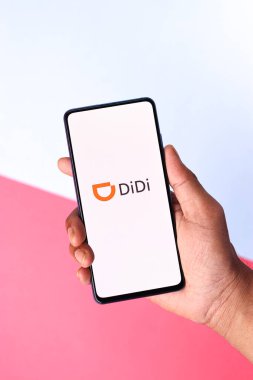 Assam, india - May 04, 2021 : DiDi logo on phone screen stock image. clipart