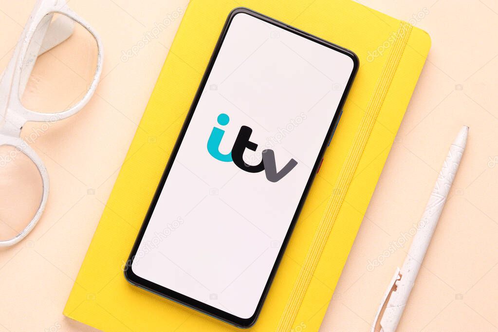 Assam, india - June 21, 2021 : ITV logo on phone screen stock image.