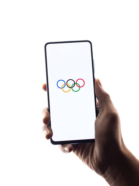 Assam, india - June 21, 2021 : Olympics logo on phone screen stock image.