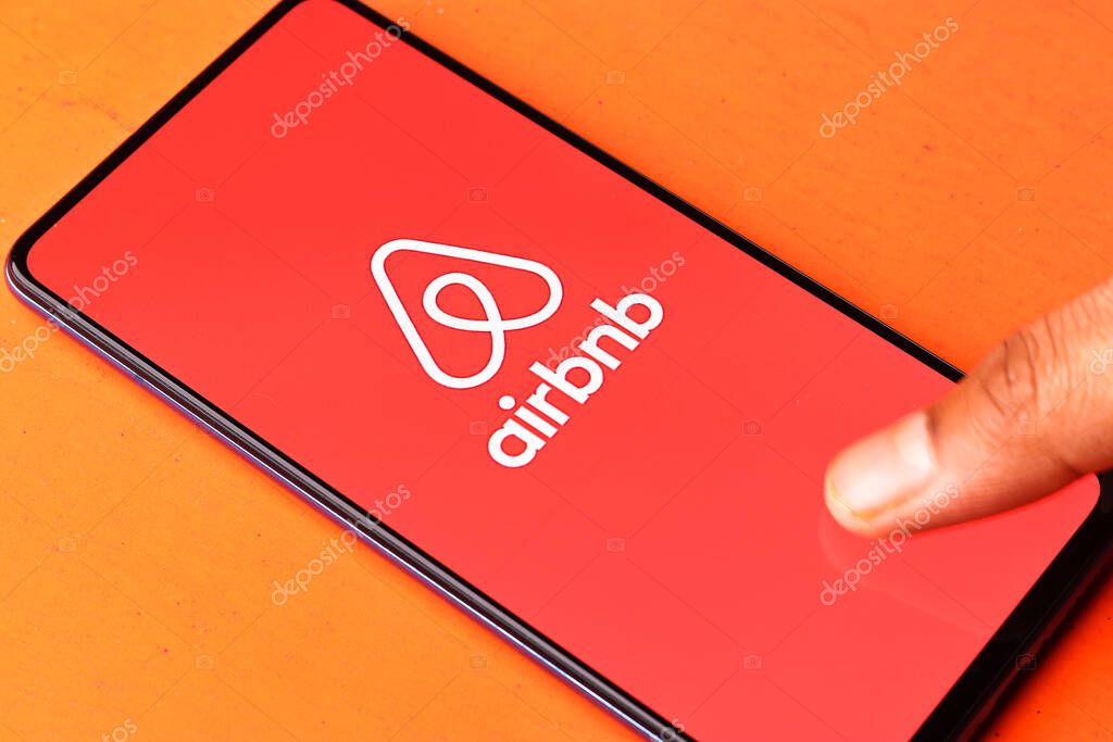 Assam, India - August 6, 2021 : Airbnb logo on phone screen stock image.