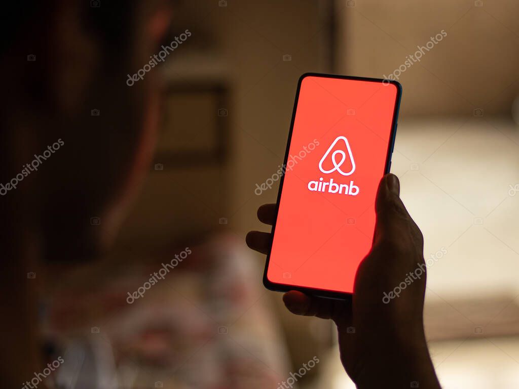 Assam, India - August 6, 2021 : Airbnb logo on phone screen stock image.
