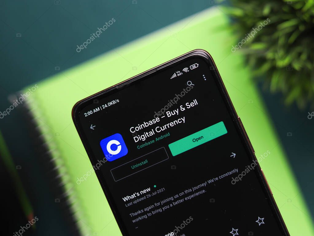 Assam, india - March 10, 2021 : Coinbase logo on phone screen stock image.