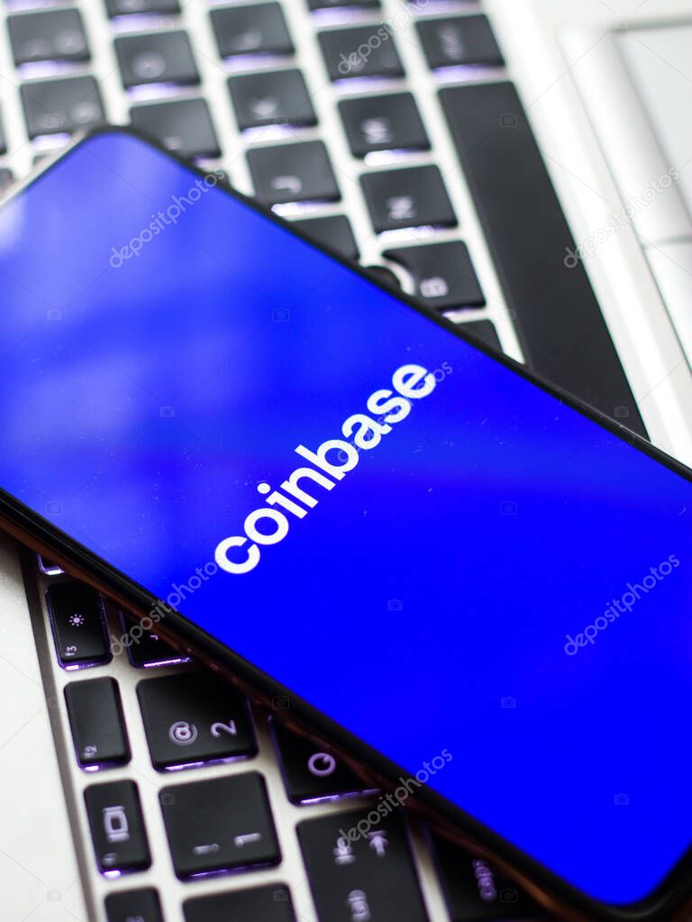 Assam, india - March 10, 2021 : Coinbase logo on phone screen stock image.