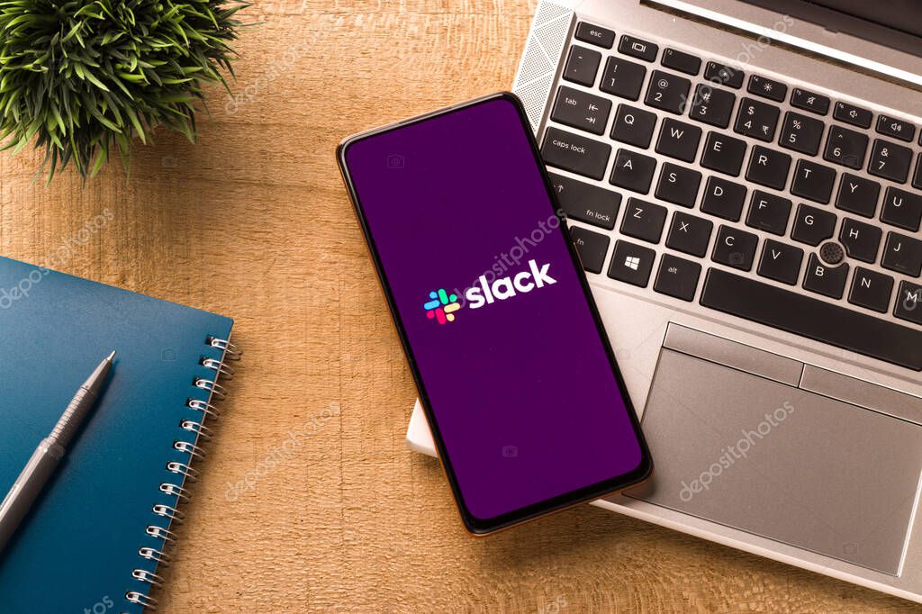 Assam, india - September 18, 2020 : Slack logo on phone screen stock image.