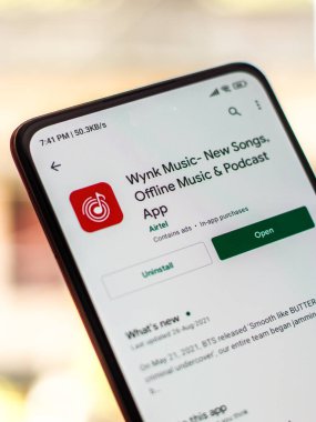 Batı Bangal, Hindistan - 28 Eylül 2021: Telefon ekranında Wynk müzik logosu.