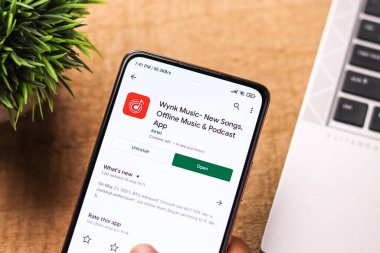 Batı Bangal, Hindistan - 28 Eylül 2021: Telefon ekranında Wynk müzik logosu.