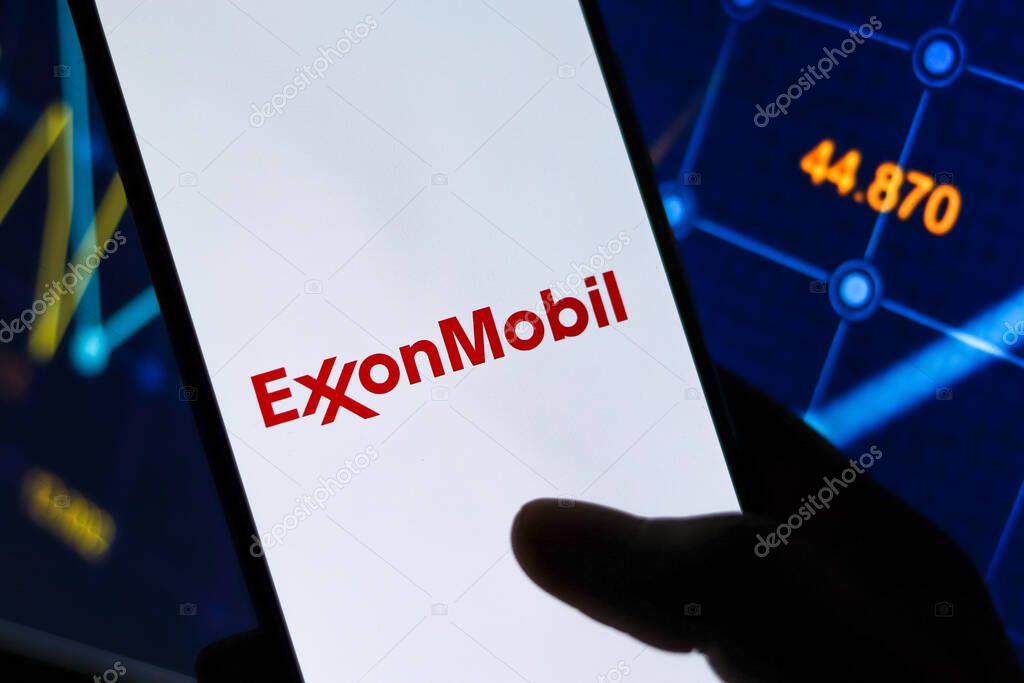 West Bangal, India - October 09, 2021 : ExxonMobil logo on phone screen stock image.