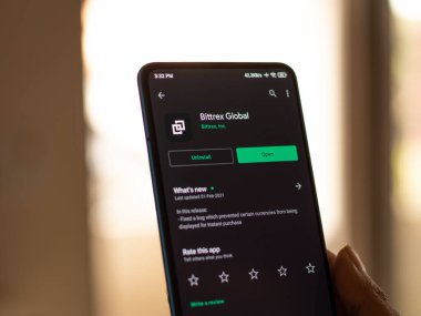 Assam, Hindistan - 10 Mart 2021: Telefon ekranı görüntüsünde Bittrex logosu.
