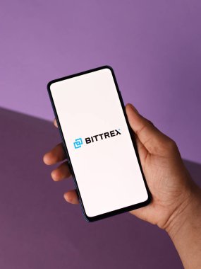 Assam, Hindistan - 10 Mart 2021: Telefon ekranı görüntüsünde Bittrex logosu.