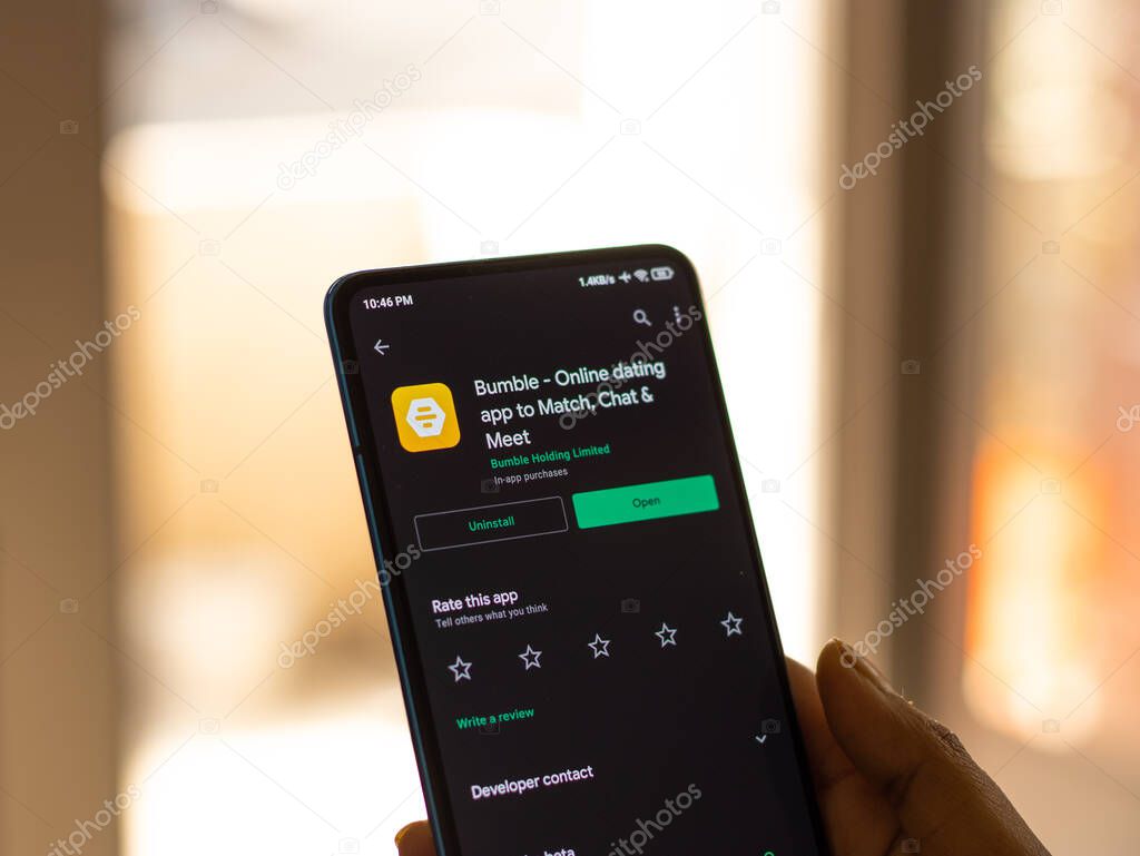 Assam, india - February 19, 2021 : Bumble logo on phone screen stock image.