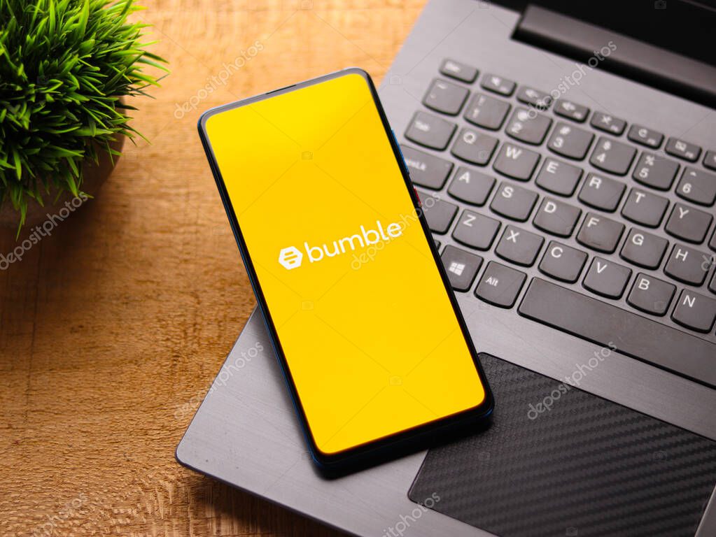 Assam, india - February 19, 2021 : Bumble logo on phone screen stock image.