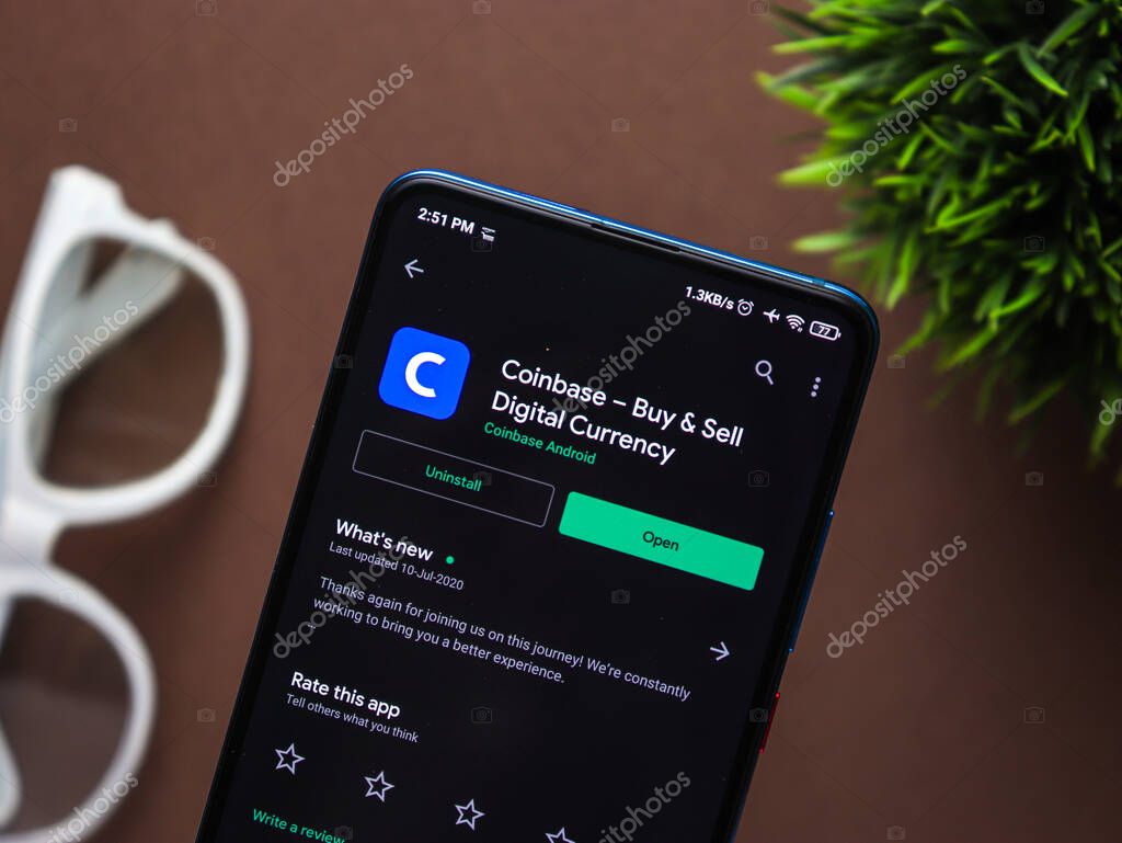 Assam, india - March 10, 2021 : Coinbase logo on phone screen stock image.