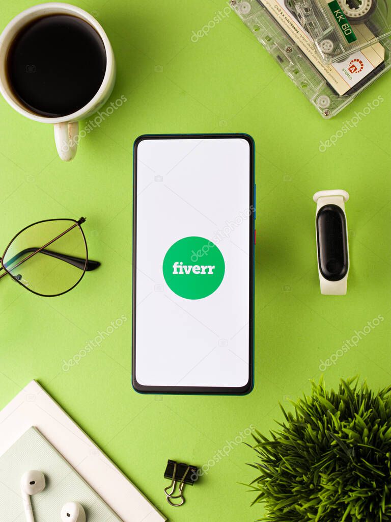 Assam, India - August 6, 2021 : Fiverr logo on phone screen stock image.