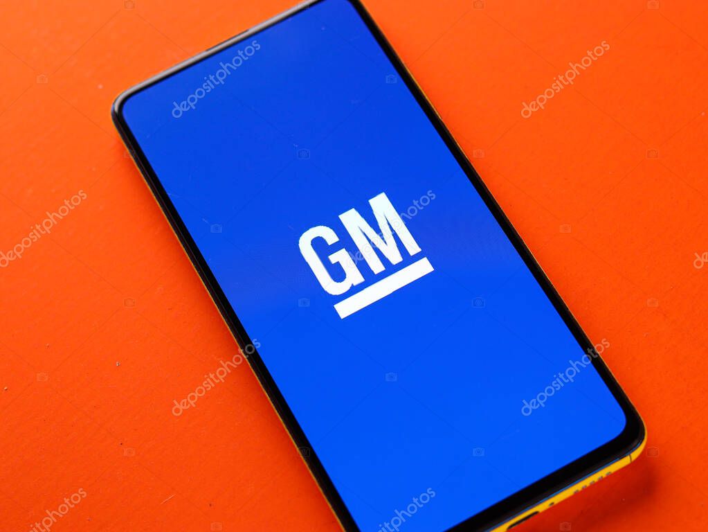 Assam, india - November 15, 2020 : General motors logo on phone screen stock image.