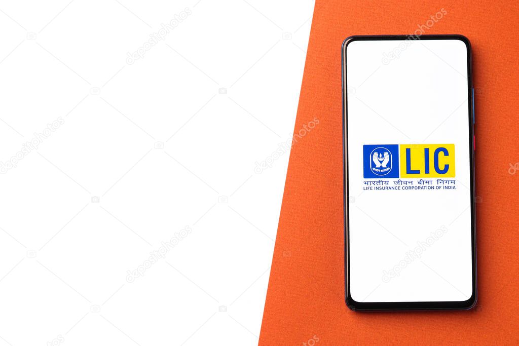 Assam, india - December 20, 2020 : LIC logo on phone screen stock image.
