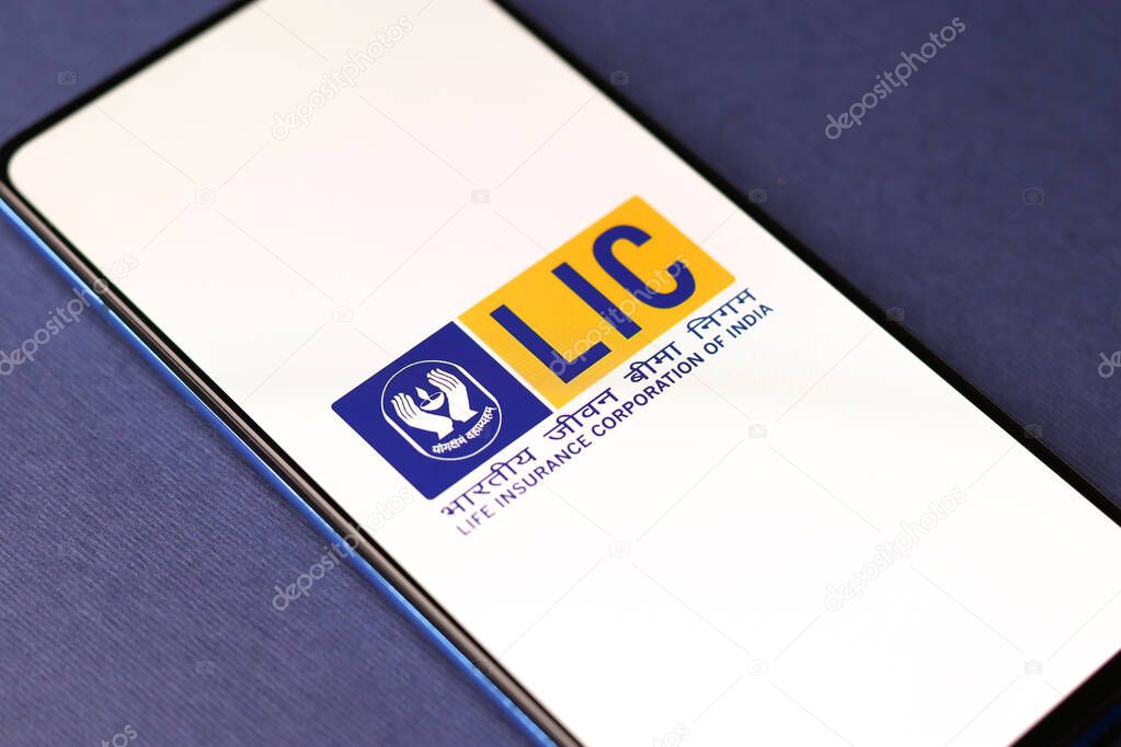 Assam, india - December 20, 2020 : LIC logo on phone screen stock image.