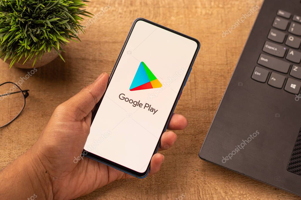 Assam, india - April 10, 2021 : Playstore logo on phone screen stock image.