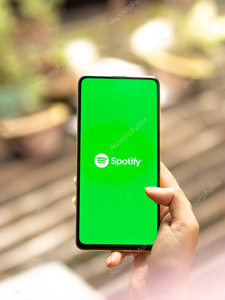 Assam, india - September 18, 2020 : Spotify logo on phone screen stock image.