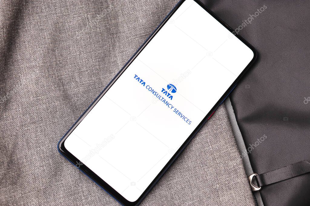 Assam, india - January 15, 2020 : Tata Consultancy Services logo on phone screen stock image.