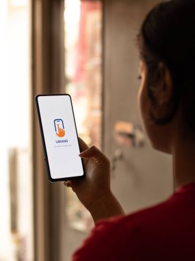 Assam, Hindistan - 10 Mart 2021: Telefon ekranında UMANG uygulama logosu.