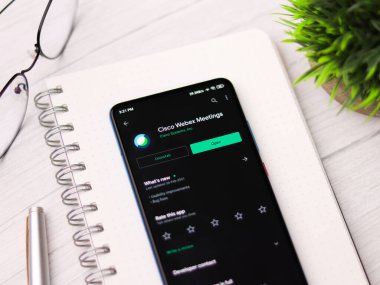 Assam, Hindistan - 10 Mart 2021 Webex Toplantılar logosu telefon ekranı görüntüsü.