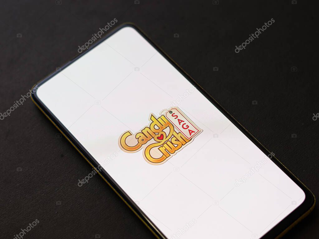 Assam, india - October 11, 2020 : Candy crush saga logo on phone screen stock image.