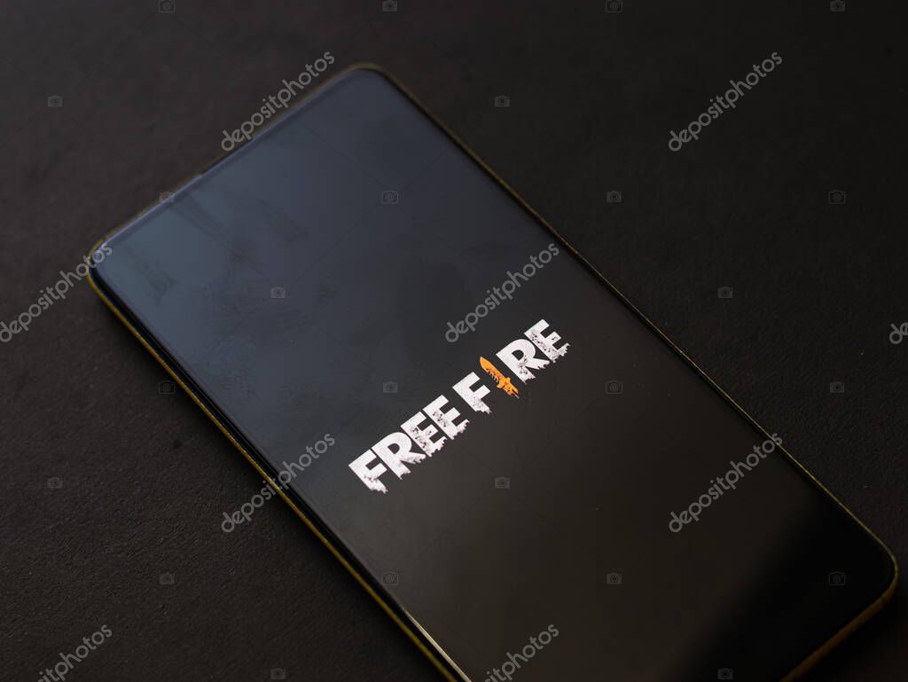Assam, india - October 11, 2020 : Free fire logo on phone screen stock image.