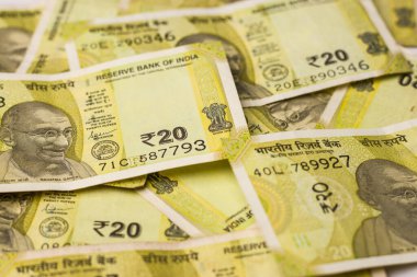 Assam, Hindistan - 30 Mart 2021: Hintli yeni 20 Rupi hisse senedi imajı.