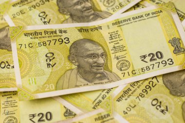 Assam, Hindistan - 30 Mart 2021: Hintli yeni 20 Rupi hisse senedi imajı.