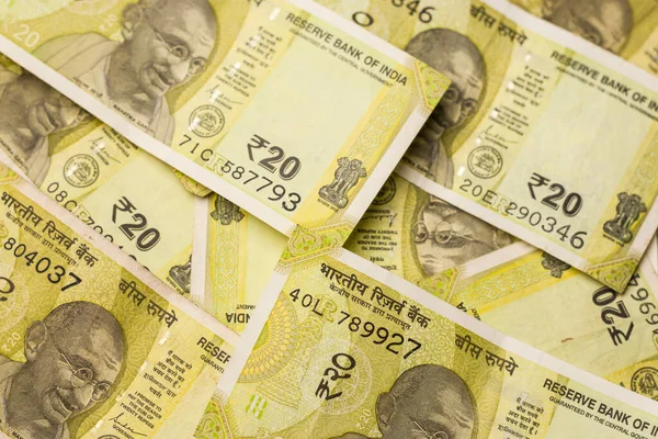 Assam, Hindistan - 30 Mart 2021: Hintli yeni 20 Rupi hisse senedi imajı.