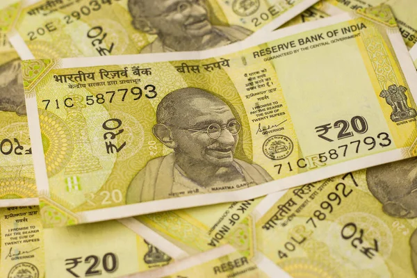 Assam, Hindistan - 30 Mart 2021: Hintli yeni 20 Rupi hisse senedi imajı.