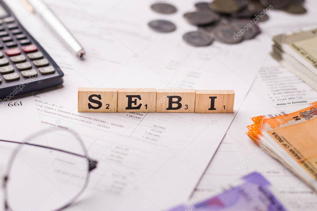 Assam, india - March 30, 2021 : Word SEBI written on wooden cubes stock image.