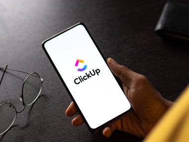 West Bangal, India - January 7, 2022 : ClickUp logo on phone screen stock image.