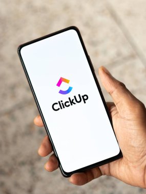West Bangal, India - January 7, 2022 : ClickUp logo on phone screen stock image.