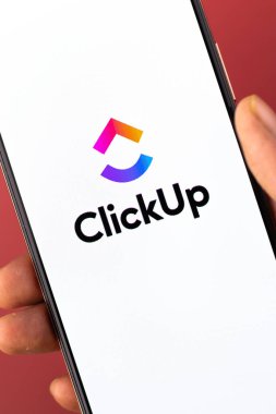 West Bangal, India - January 7, 2022 : ClickUp logo on phone screen stock image.