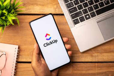 West Bangal, India - January 7, 2022 : ClickUp logo on phone screen stock image.