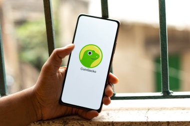 West Bangal, India - January 7, 2022 : CoinGecko logo on phone screen stock image.
