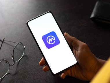 West Bangal, India - December 15, 2021 : CoinMarketCap logo on phone screen stock image.