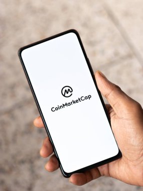 West Bangal, India - December 15, 2021 : CoinMarketCap logo on phone screen stock image.