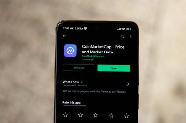 West Bangal, India - December 15, 2021 : CoinMarketCap logo on phone screen stock image.