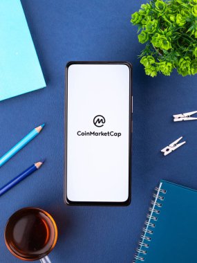 West Bangal, India - December 15, 2021 : CoinMarketCap logo on phone screen stock image.