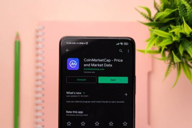 West Bangal, India - December 15, 2021 : CoinMarketCap logo on phone screen stock image.