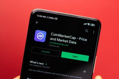 West Bangal, India - December 15, 2021 : CoinMarketCap logo on phone screen stock image.